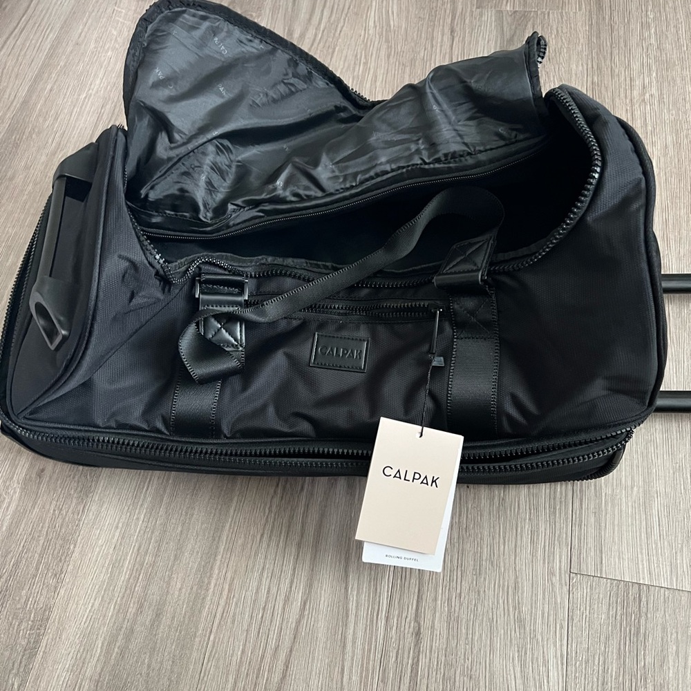 Calpak Stevyn 22" Rolling Duffel Bag- Black